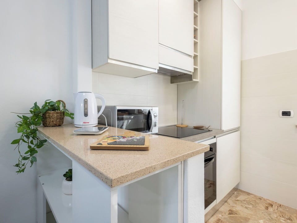 Kitchen Appliance, Kitchen, Interior Design, Flooring, Countertop, Wood, Major Appliance, Furniture, Floor, Cabinetry