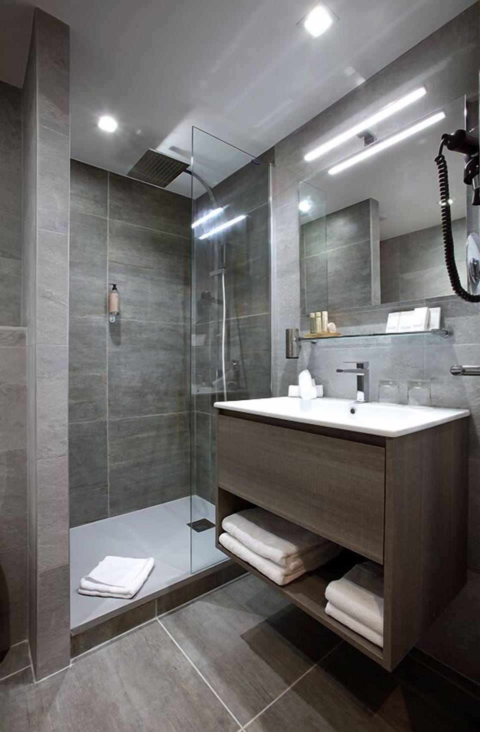 Rainfall showerhead, designer toiletries, hair dryer, bathrobes
