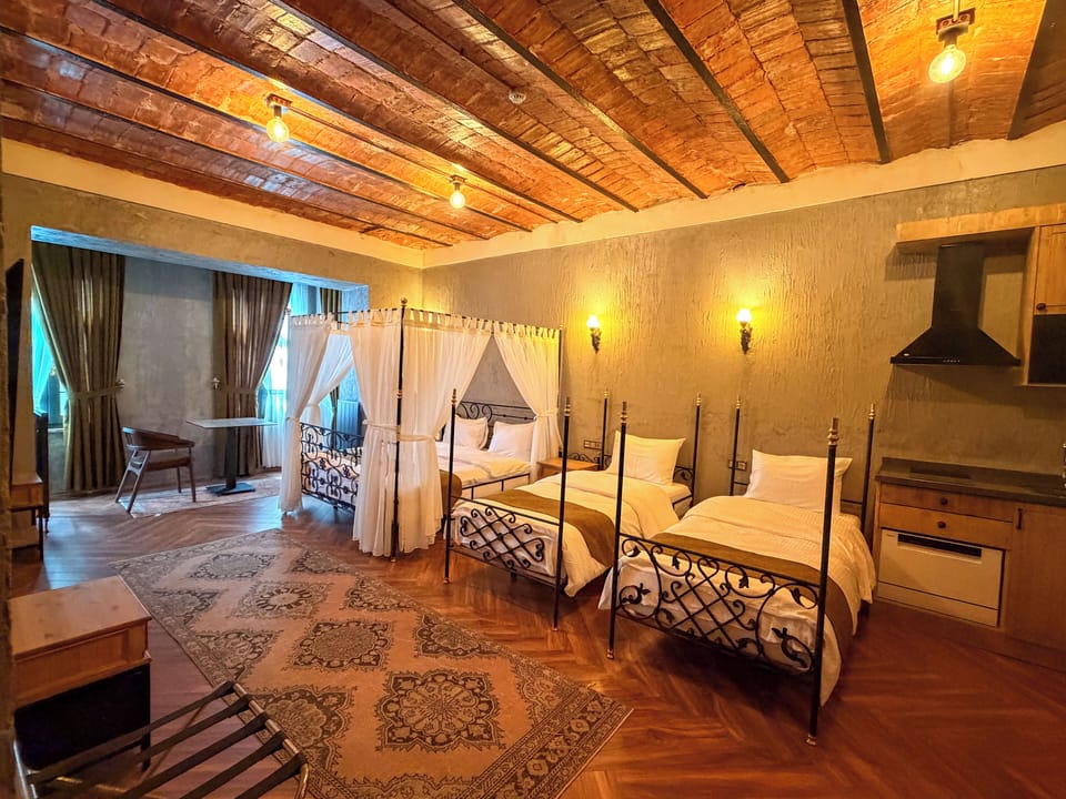 Luxury Quadruple Room | Iron/ironing board, free WiFi, bed sheets