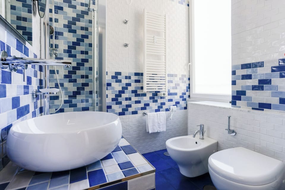 Double Room, 1 Double Bed, Non Smoking, Pets Not Allowed | Bathroom | Shower, rainfall showerhead, hair dryer, bidet