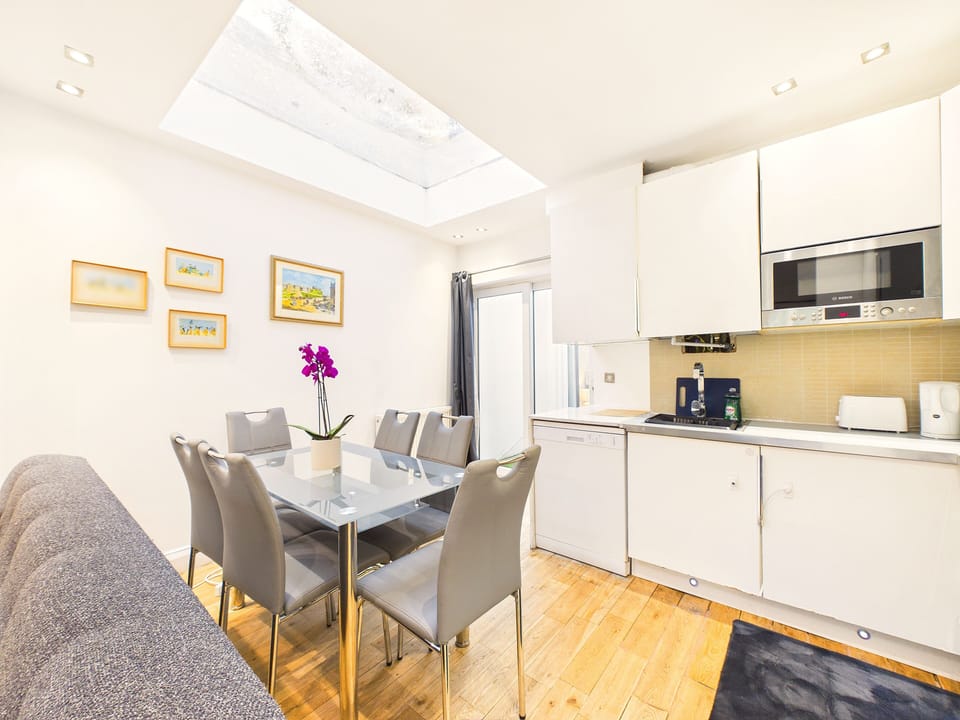 Comfort Apartment, Patio, Garden Area | Private kitchen | Full-size fridge, microwave, oven, stovetop
