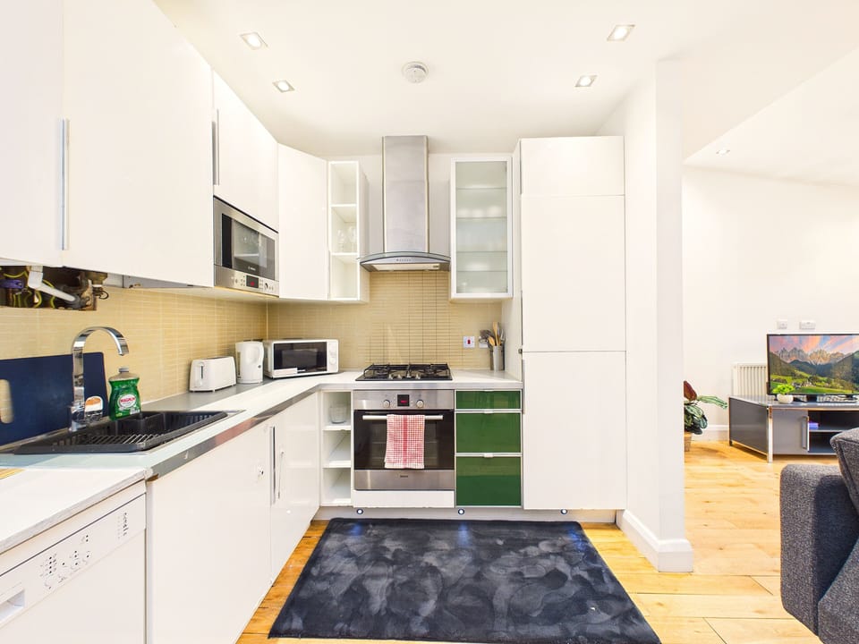 Comfort Apartment, Patio, Garden Area | Private kitchen | Full-size fridge, microwave, oven, stovetop