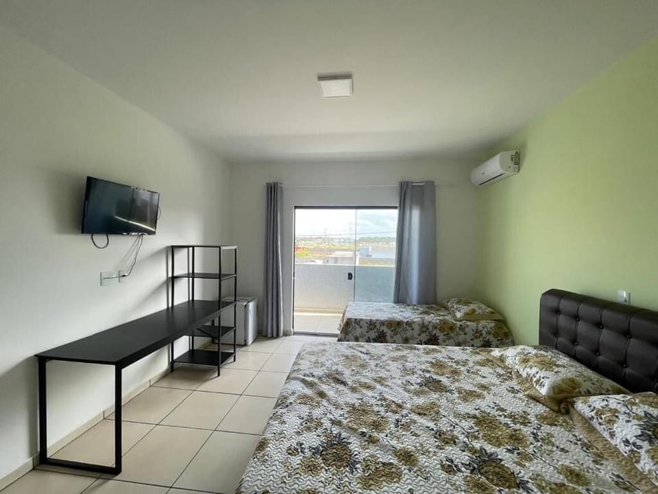 Family Room, Balcony, City View | Desk, laptop workspace, free WiFi, bed sheets