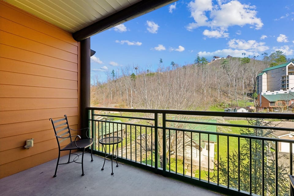 Step out onto your private balcony and soak in sweeping mountain views while enjoying your morning coffee on comfortable outdoor seating.