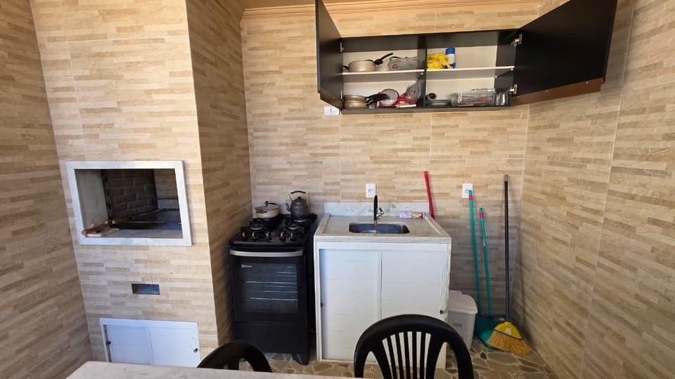 Mini-fridge, stovetop, cookware/dishes/utensils