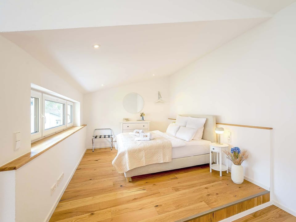 A comfortable king-size box spring bed for restful nights.