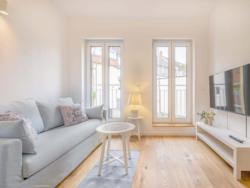 A comfortable sofa area with TV, perfect for unwinding after a long day.
