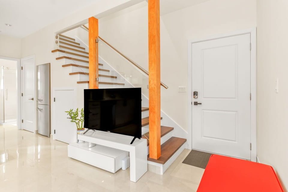TV in the living room + upstair to the 2nd floor.