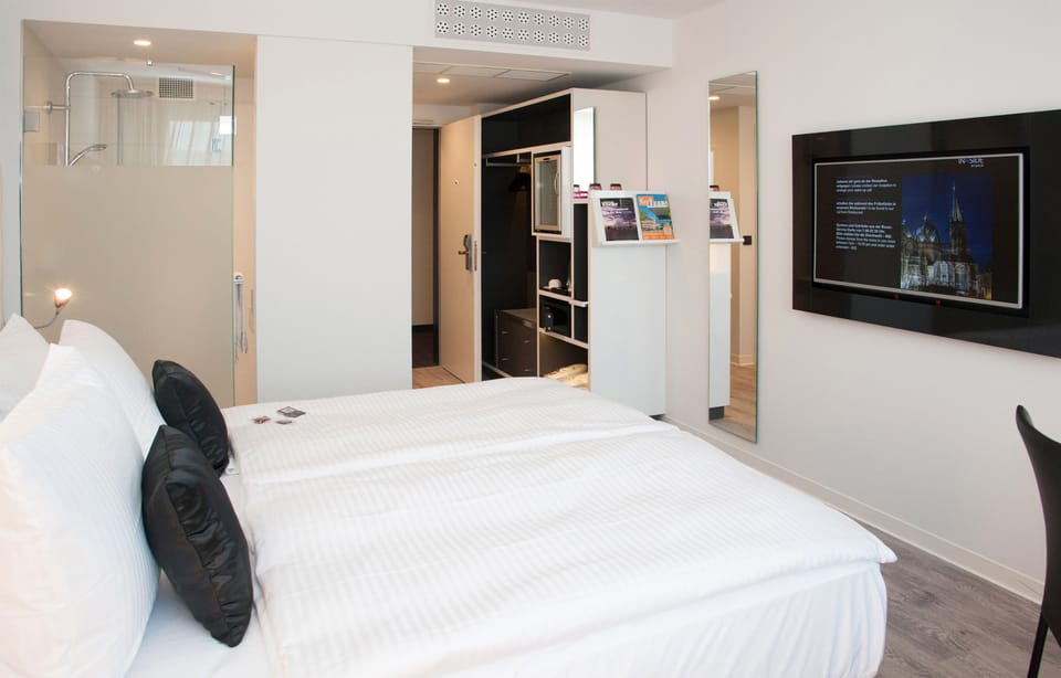 The Innside Room | Premium bedding, free minibar, in-room safe, desk