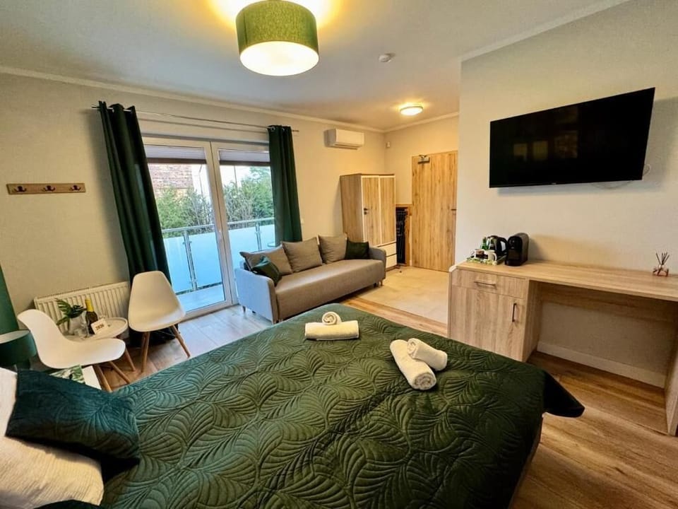 Deluxe Double Room, Balcony, Garden View | Desk, free WiFi