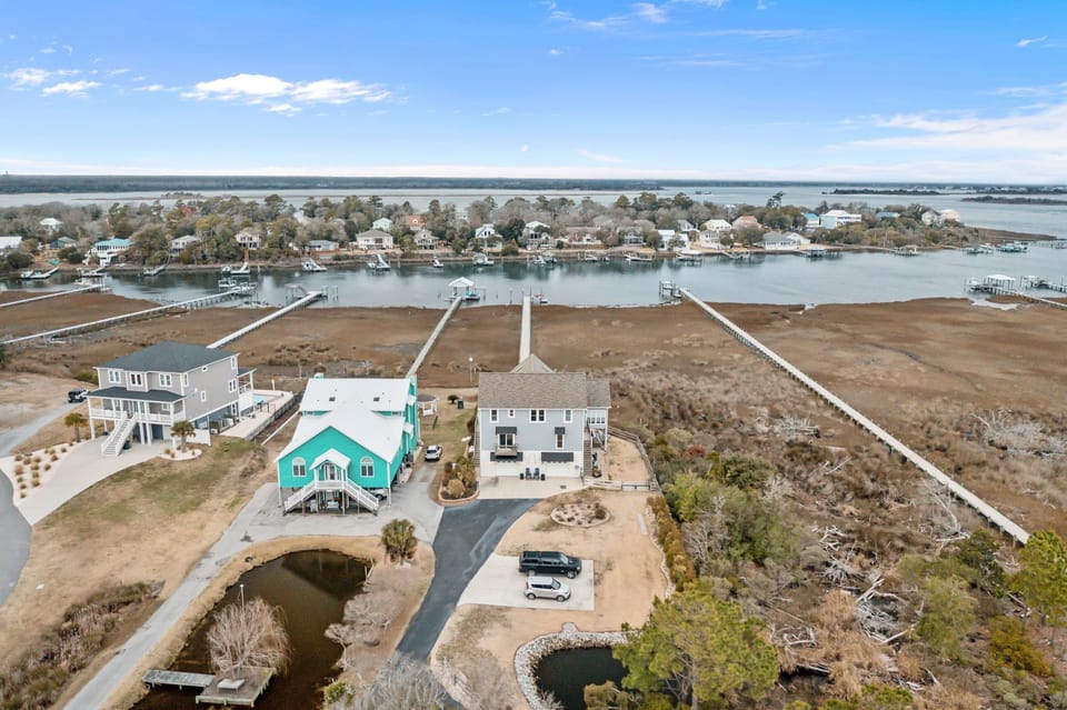 Stunning waterfront property featuring direct marina access and private docks in a peaceful coastal community.