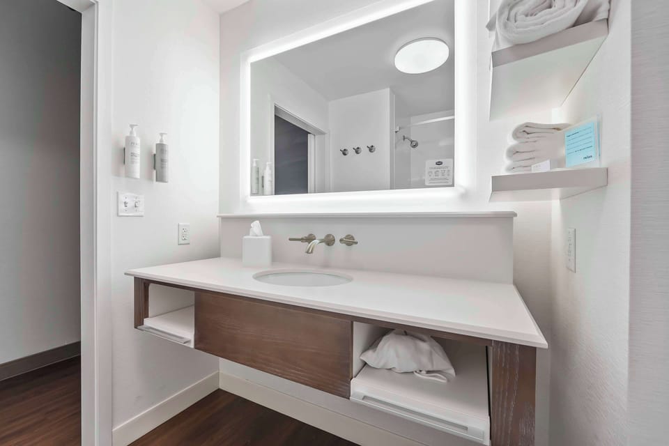 Room, 2 Queen Beds, Non Smoking, Refrigerator & Microwave | Bathroom | Combined shower/tub, free toiletries, hair dryer, towels