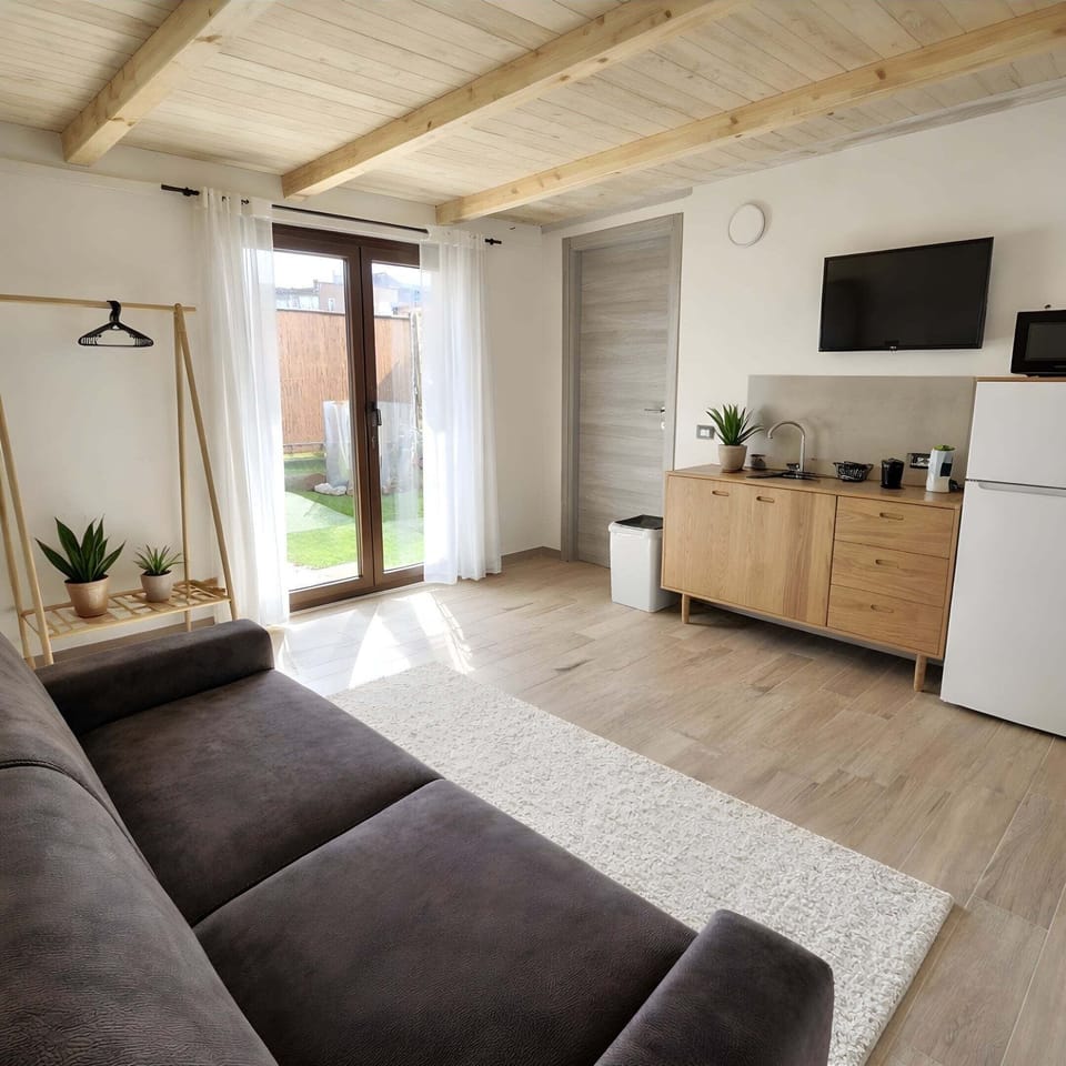 Apartment, Garden View | Living area | TV