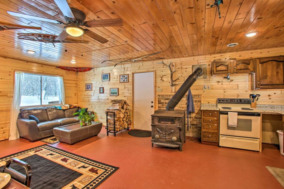 Living Room | Wood Stove | Sectional Seating & Interior Access