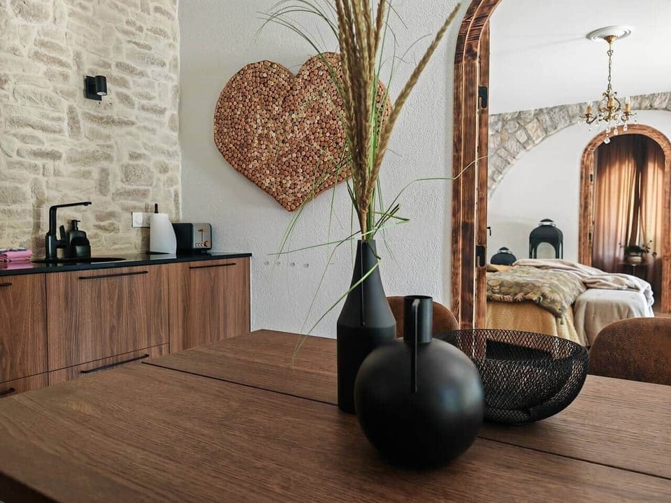 Kitchenette and dining area with direct view into the bedroom