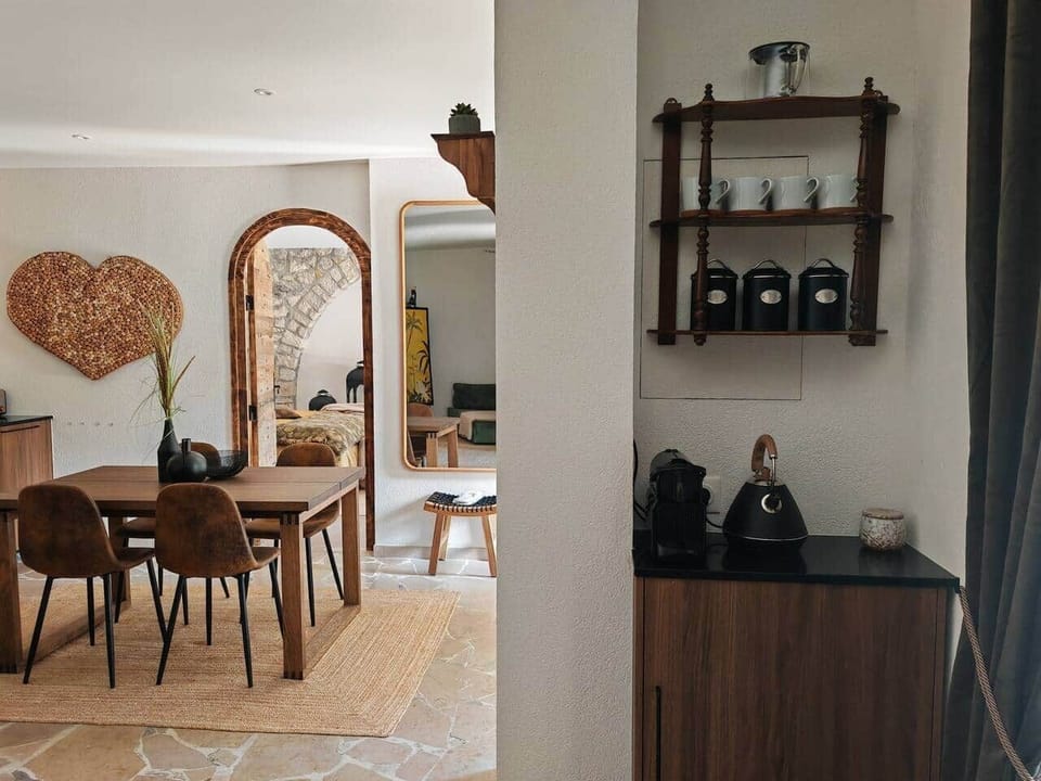 Kitchenette with coffee station, open to the dining area