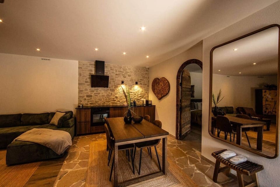 Dining area and kitchenette with stone details