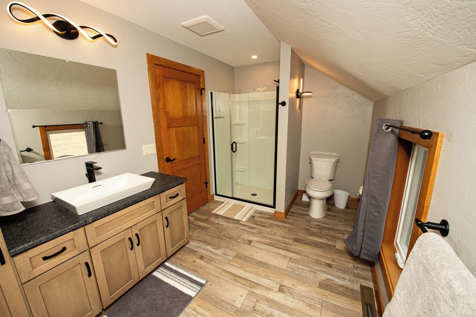 Upstairs bathroom with walk in shower