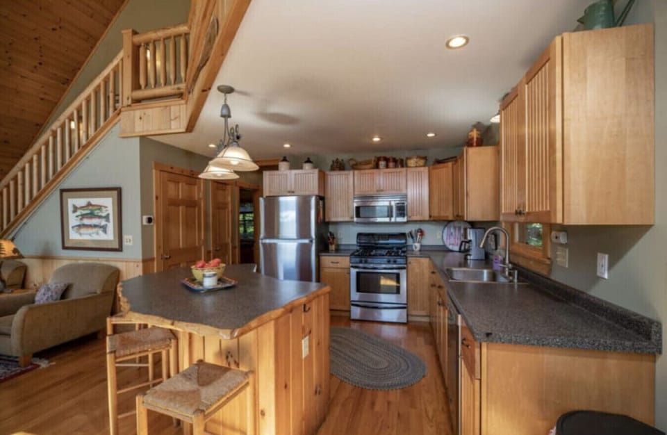 Kitchen | Stainless Steel Appliances | Bar Seating & Open Layout