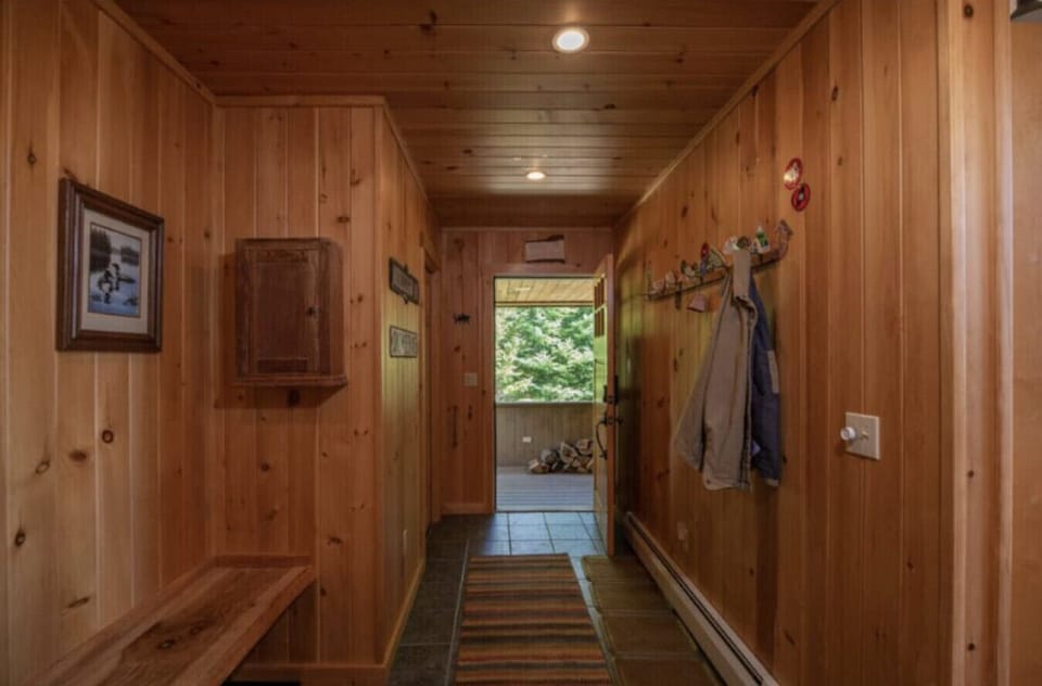 Hallway | Storage Hooks | Wood Walls & Tile Flooring