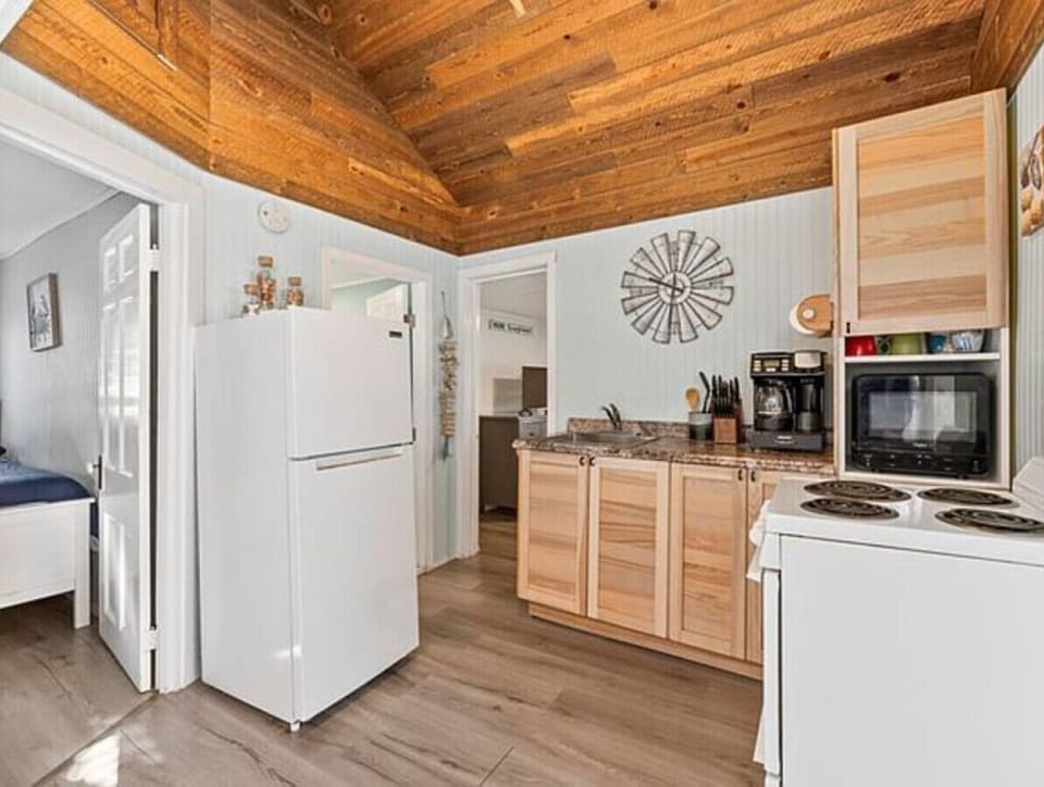 Kitchen | Refrigerator | Electric Stove & Bedroom Access