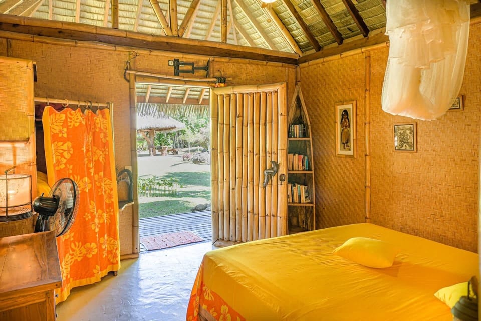 Bedroom with garden-facing entrance.