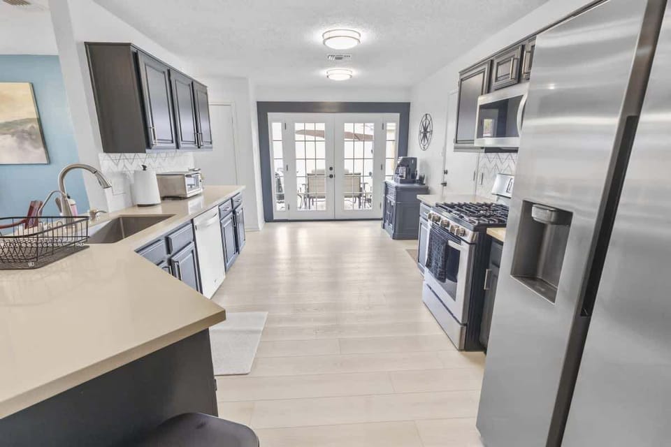 Gourmet Kitchen: Unleash your inner chef with modern appliances and vibrant natural light!