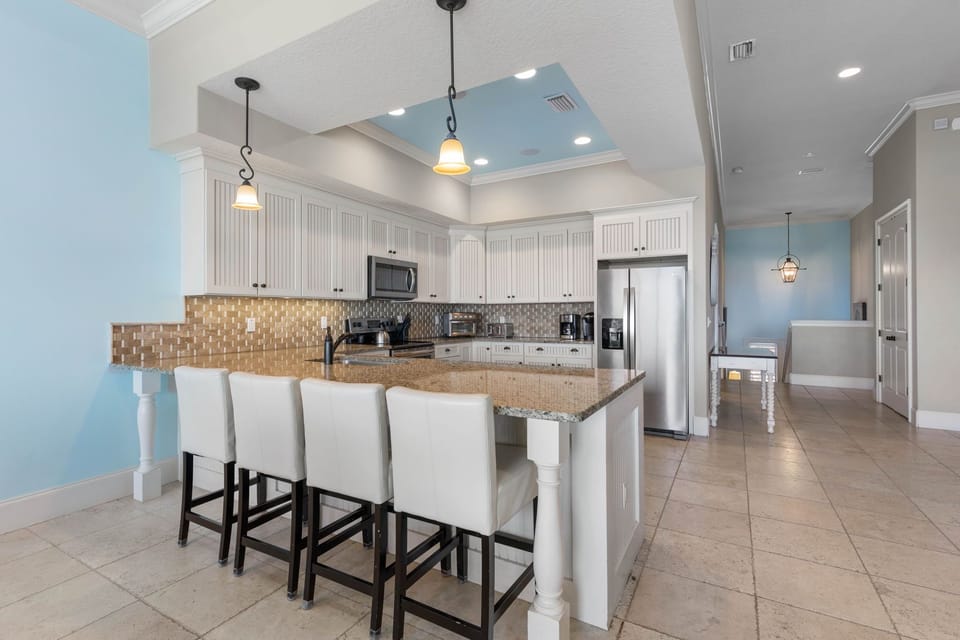 Morning coffee turns into pancakes and laughter around the island, where everyone gathers without trying. Sunlight drifts in, stories unfold, and the kitchen becomes the heart of the home, holding the kind of moments that stay with you long after.
