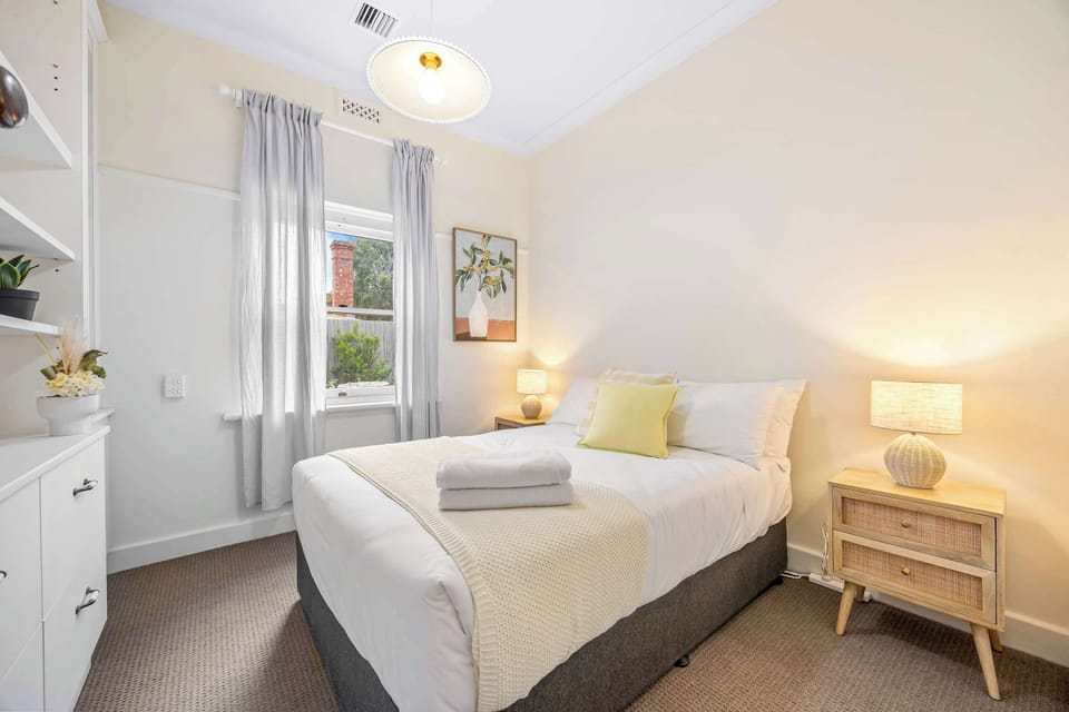 Bedroom 3 - queen size bed, ample storage.