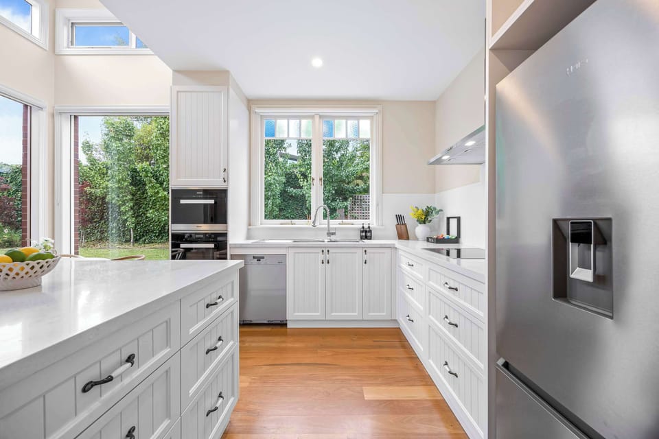 Modern and fully-equipped kitchen with large fridge, dishwasher, oven, microwave, pod coffee machine and more!