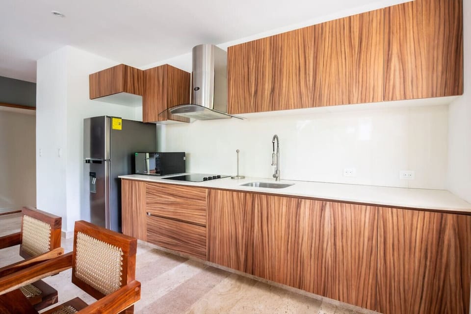 Modern fully equipped kitchen with quality appliances.