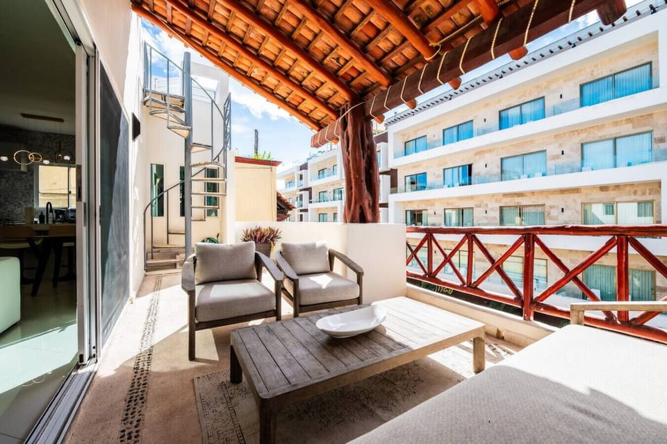 Private terrace with cozy seating and a relaxing outdoor vibe.