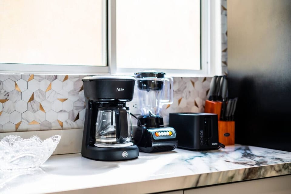 Coffee maker, blender, and toaster for easy breakfasts.