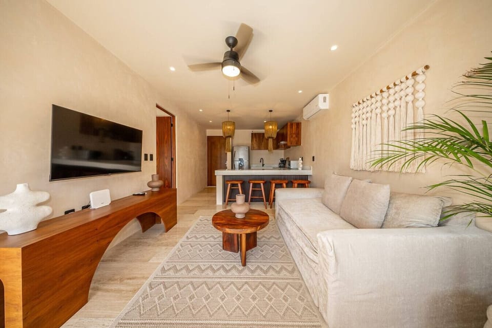 Bright lounge with natural light and cozy vibes.