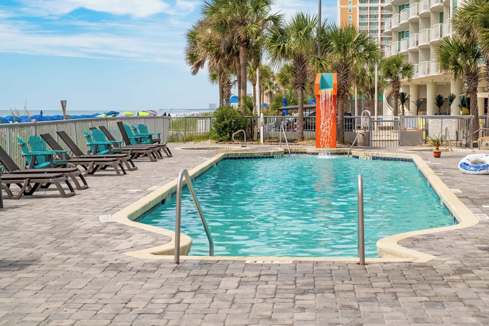 This stunning beachfront resort features a sparkling outdoor pool ,