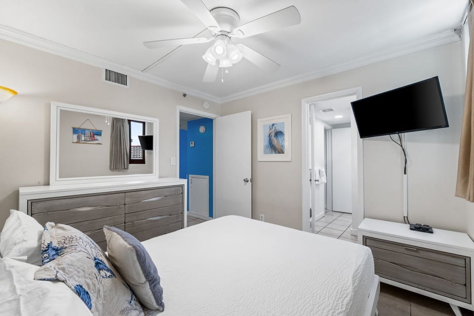 Master Bedroom with a queen bed and TV
