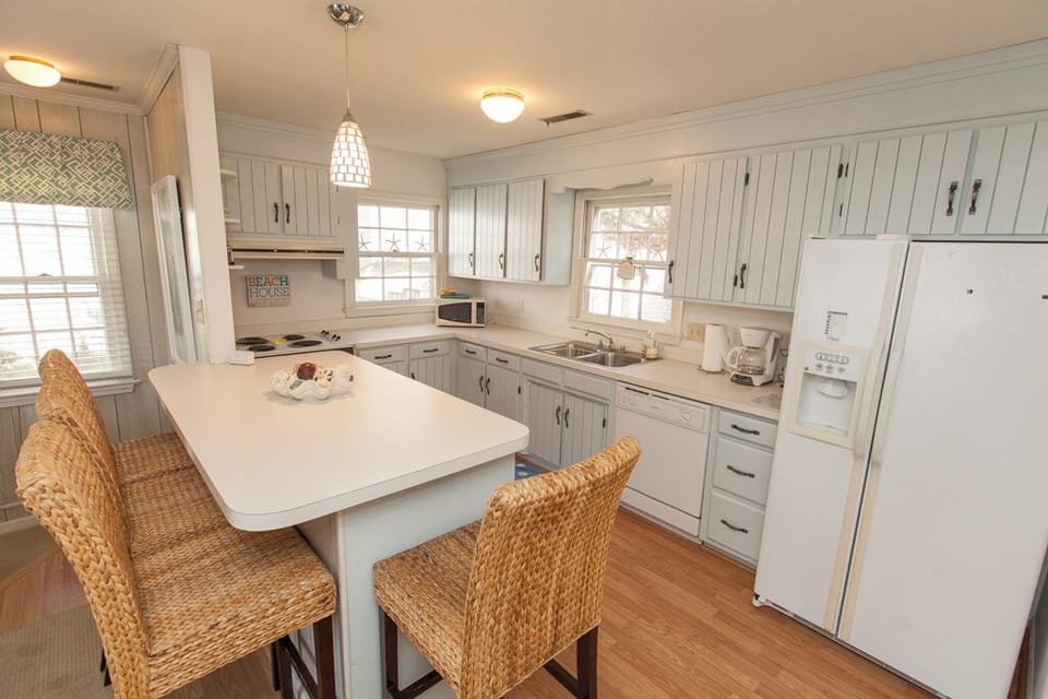 2nd floor 
Kitchen with wide counter bar that opens up to the living area