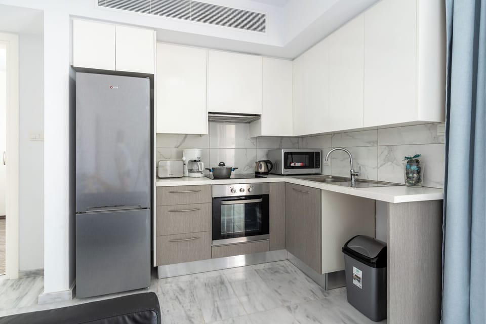 Apartment, 1 Double Bed with Sofa bed, Kitchen, Sea View | Private kitchen | Coffee/tea maker, full-size fridge, microwave, oven