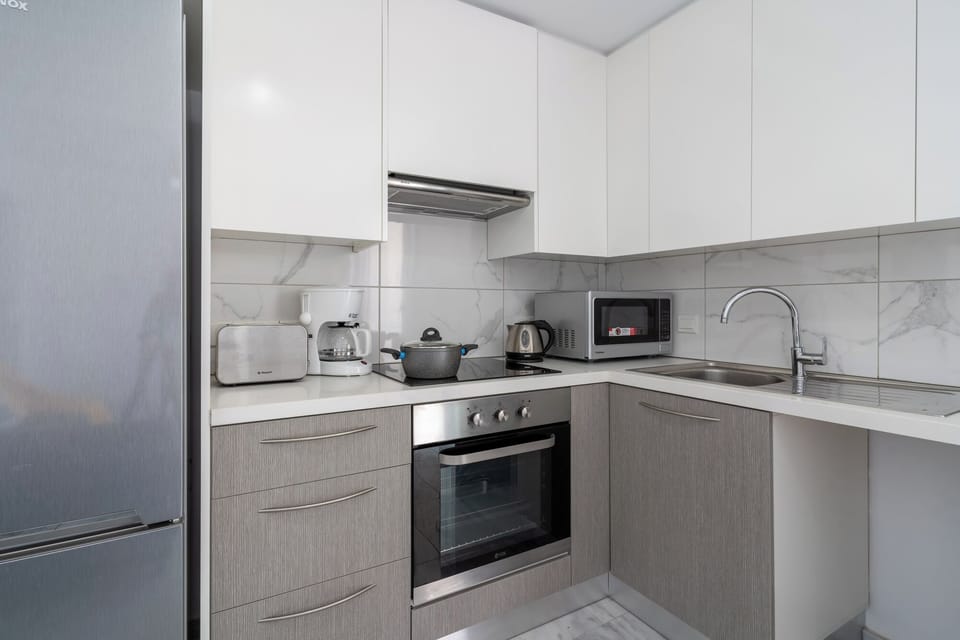 Apartment, 1 Double Bed with Sofa bed, Kitchen, Sea View | Private kitchen | Coffee/tea maker, full-size fridge, microwave, oven