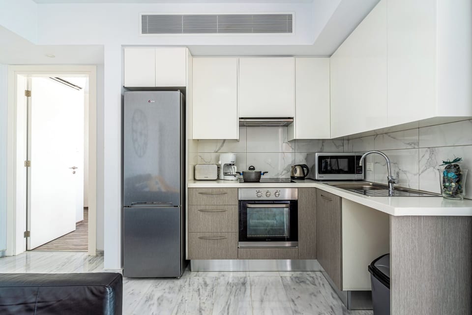 Apartment, 1 Double Bed with Sofa bed, Kitchen, Sea View | Private kitchen | Coffee/tea maker, full-size fridge, microwave, oven