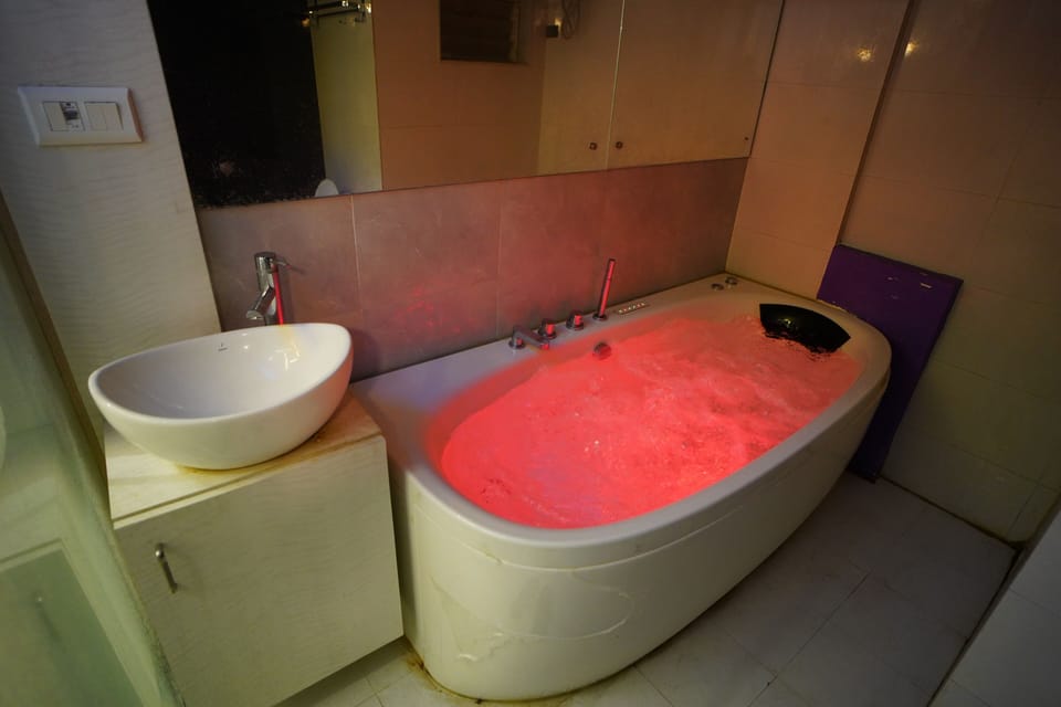 Deluxe Studio | Bathroom | Slippers, bidet, soap, shampoo