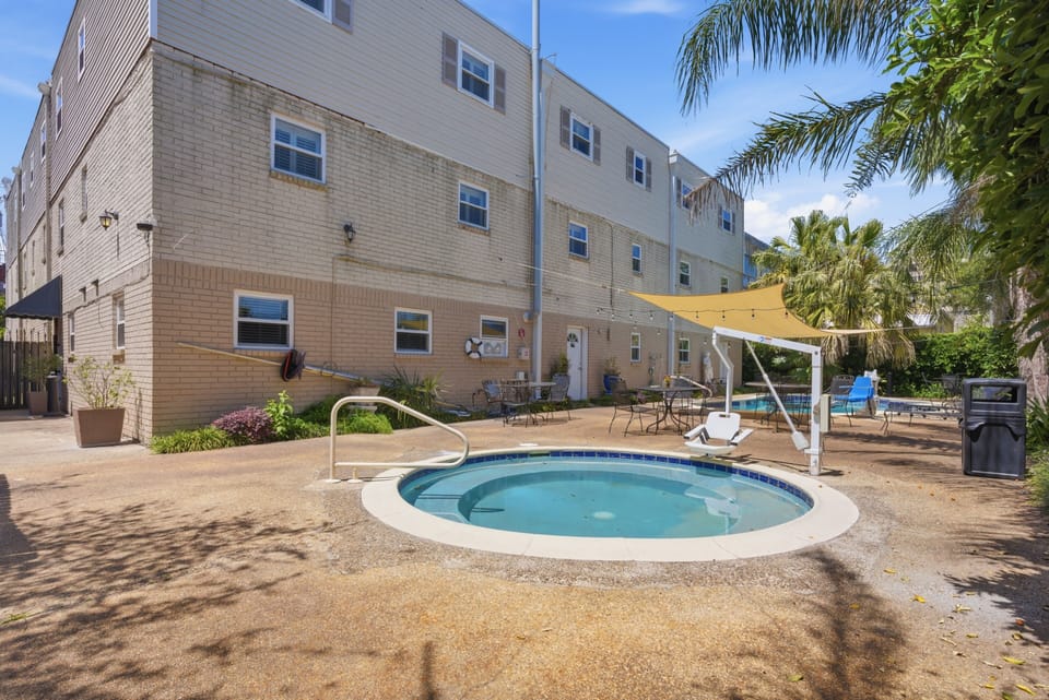 Soak away the day in the outdoor hot tub under an open sky.
