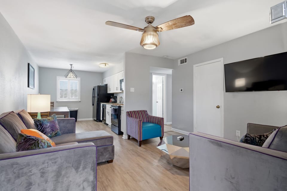 Modern living area w/ a smart TV & stylish seating to unwind.
