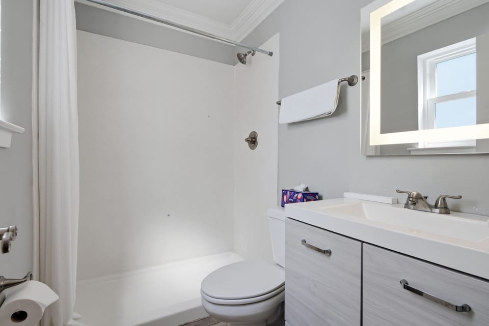 Minimal bathroom w/ a clean, modern feel for a fresh start.
