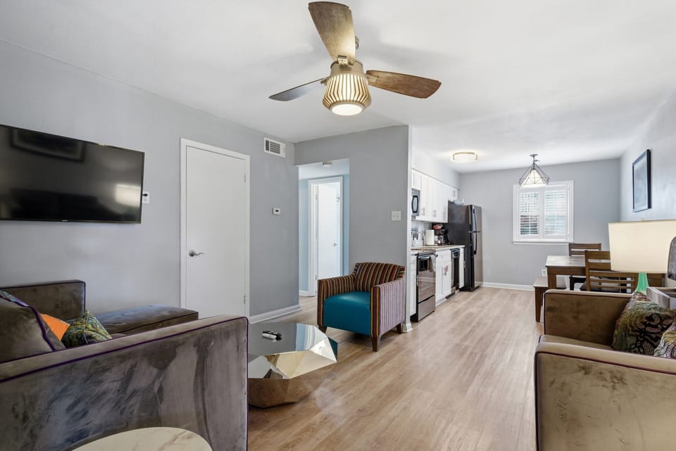 Light-filled living room w/ a welcoming entryway that sets the tone.
