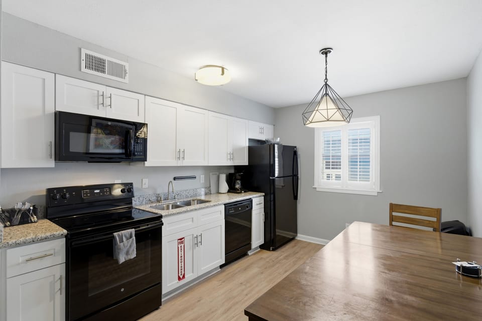 Kitchen area with an elegant look + dining area to bake and bite at the same time!