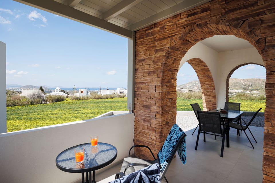 Patio with ocean and town view