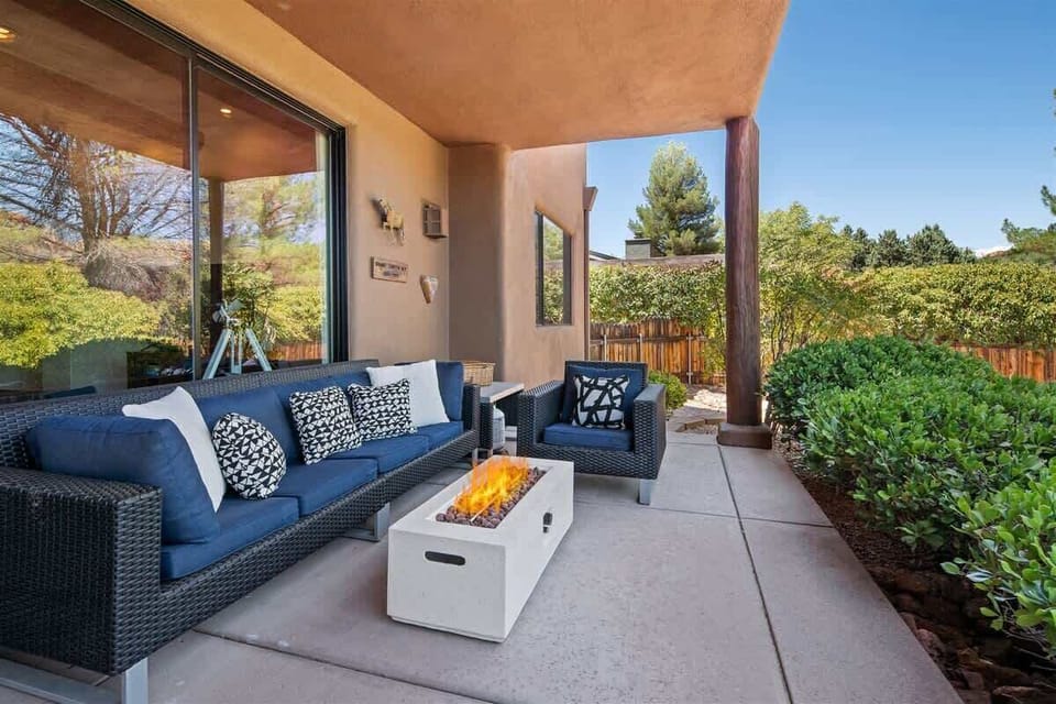 Furnished outdoor patio with gas firepit