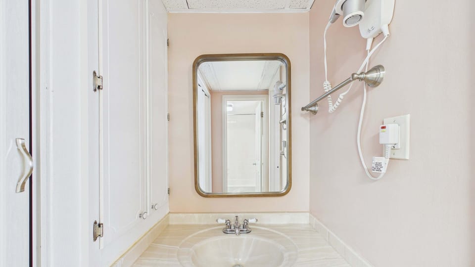 Full bathroom with shower and tub combo