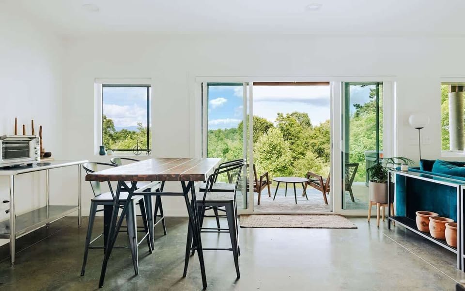  Indoor-outdoor dining with mountain views.